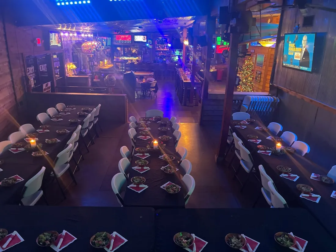 Tables set for dinner inside Freddy T's dining room